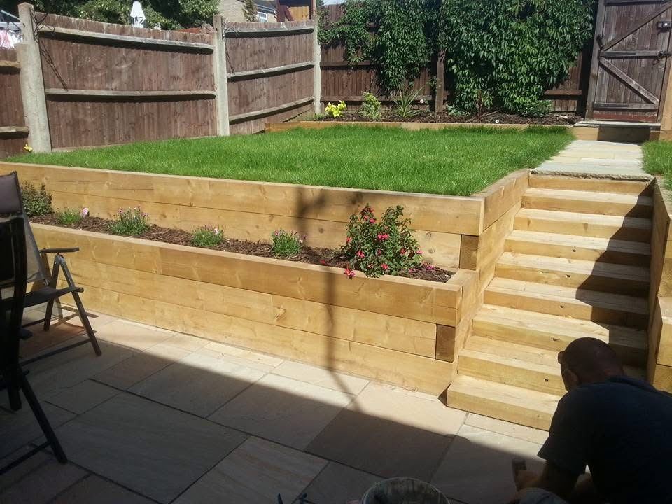 Timber sleeper raised beds with steps and new turf